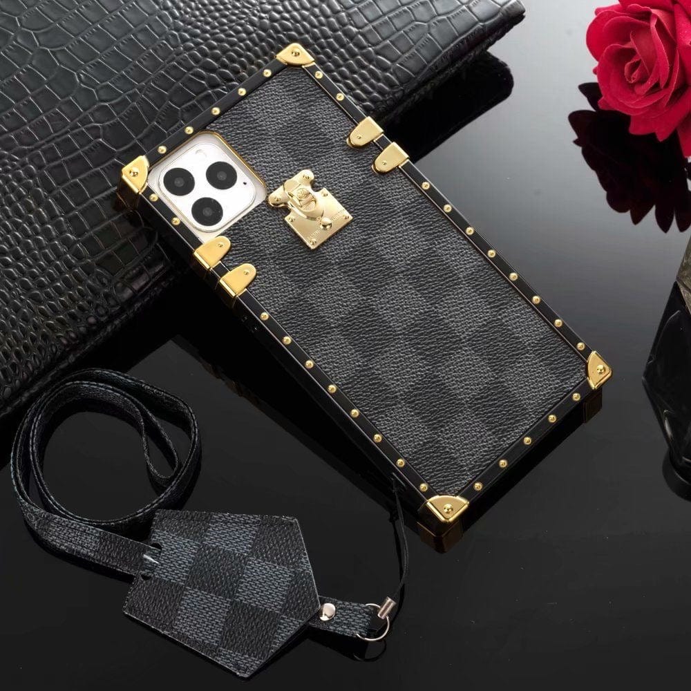 Tunde Store Louis Vuitton Checkered Trunk-Inspired iPhone Cases with Gold Hardware