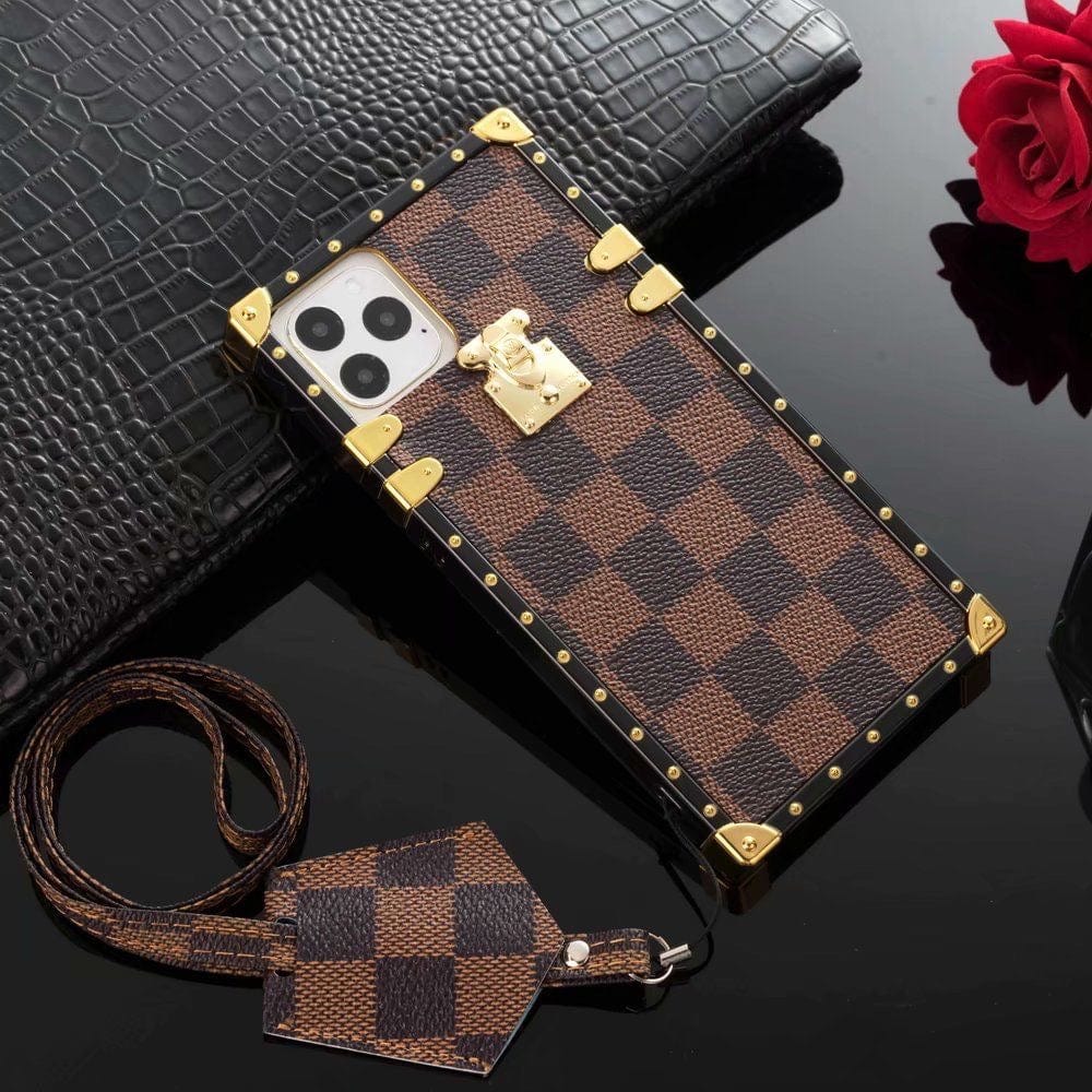 Tunde Store Louis Vuitton Checkered Trunk-Inspired iPhone Cases with Gold Hardware