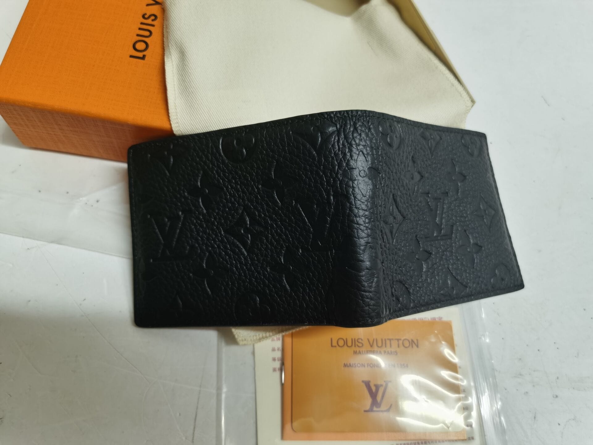 Tunde Store Embossed Black Leather Compact Wallet