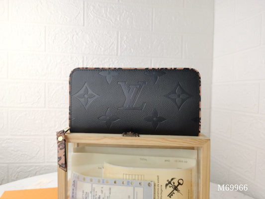Tunde Store Engraved Louis Vuitton Leather Wallet