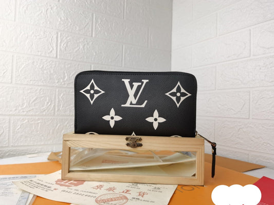 Tunde Store Louis Vuitton Leather Zipper Wallet