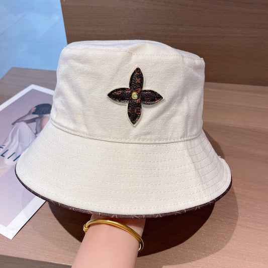 Tunde Store Louis Vuitton Monogram Bucket Hat with Floral Appliqué