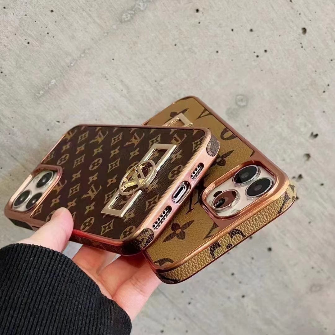 Tunde Store Louis Vuitton Monogram iPhone 15 Case with Golden Louis Vuitton Inlay