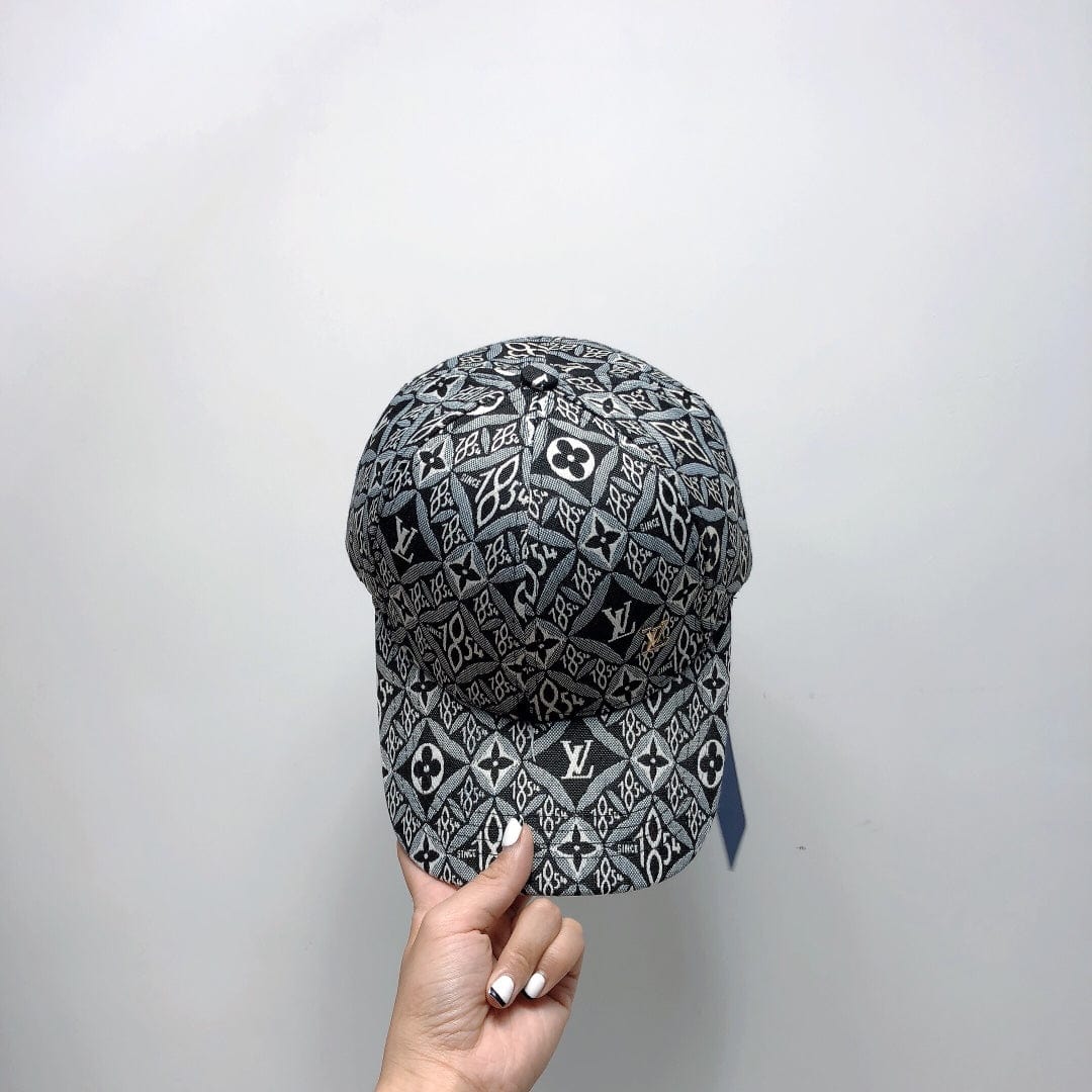 Tunde Store Louis Vuitton Signature Monogram Cap in Black and White